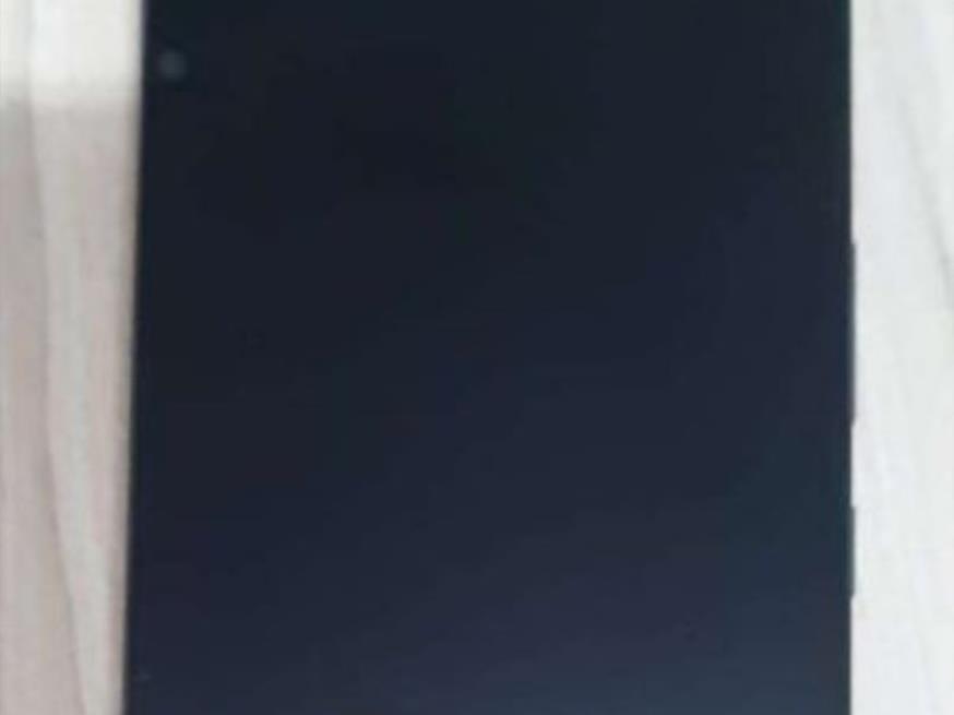 Foto ilustrativa 2 - Celular Realme, capa traseira cor preta.