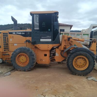 PÁ CARREGADEIRA HYUNDAI HL 740 – 9BD, ANO: 2014, CHASSI: HBRH740DAE0000419, NO ESTADO EM QUE SE ENCONTRA.