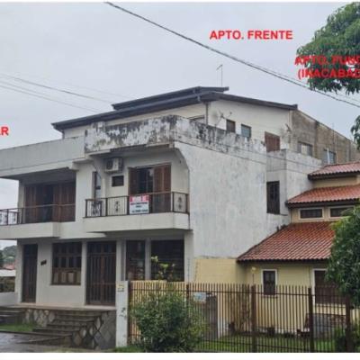 Sala comercial e dois apartamentos