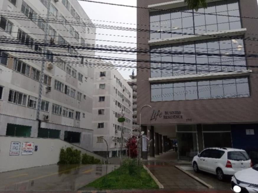 Foto ilustrativa 2 - São José/SC – Roçado – Sala com 60m²