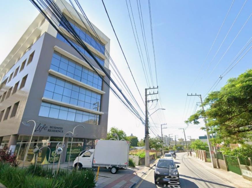 Foto ilustrativa 27 - São José/SC – Roçado – Sala com 60m²