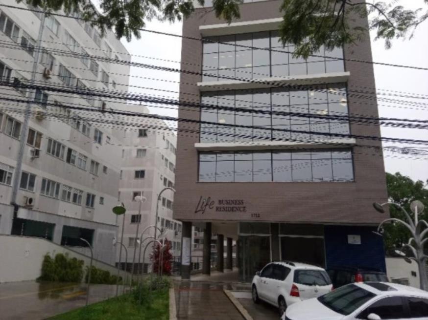 Foto ilustrativa 3 - São José/SC – Roçado – Sala com 60m²
